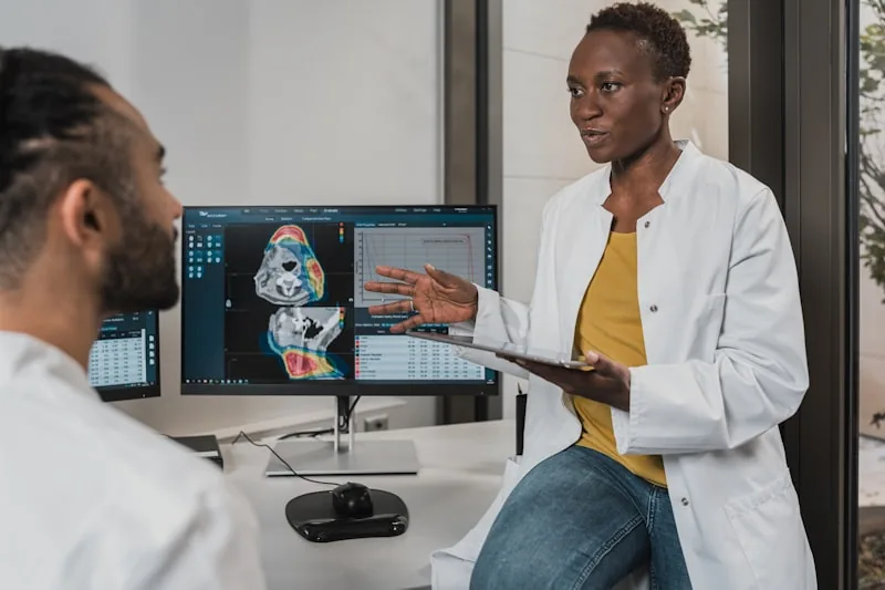 Dentists reviewing a 3D dental scan